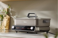 美的发布5分钟超速沸电火锅：0氟健康涂层+超薄分体设计，聚会涮烤无需等待