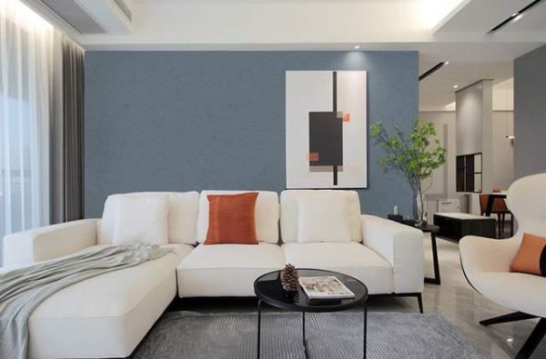 Living room with bright solid color wallpaper